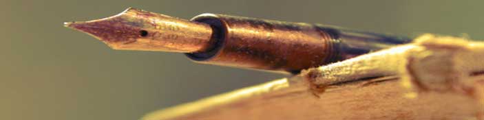 history - banner fountain pen and antique book